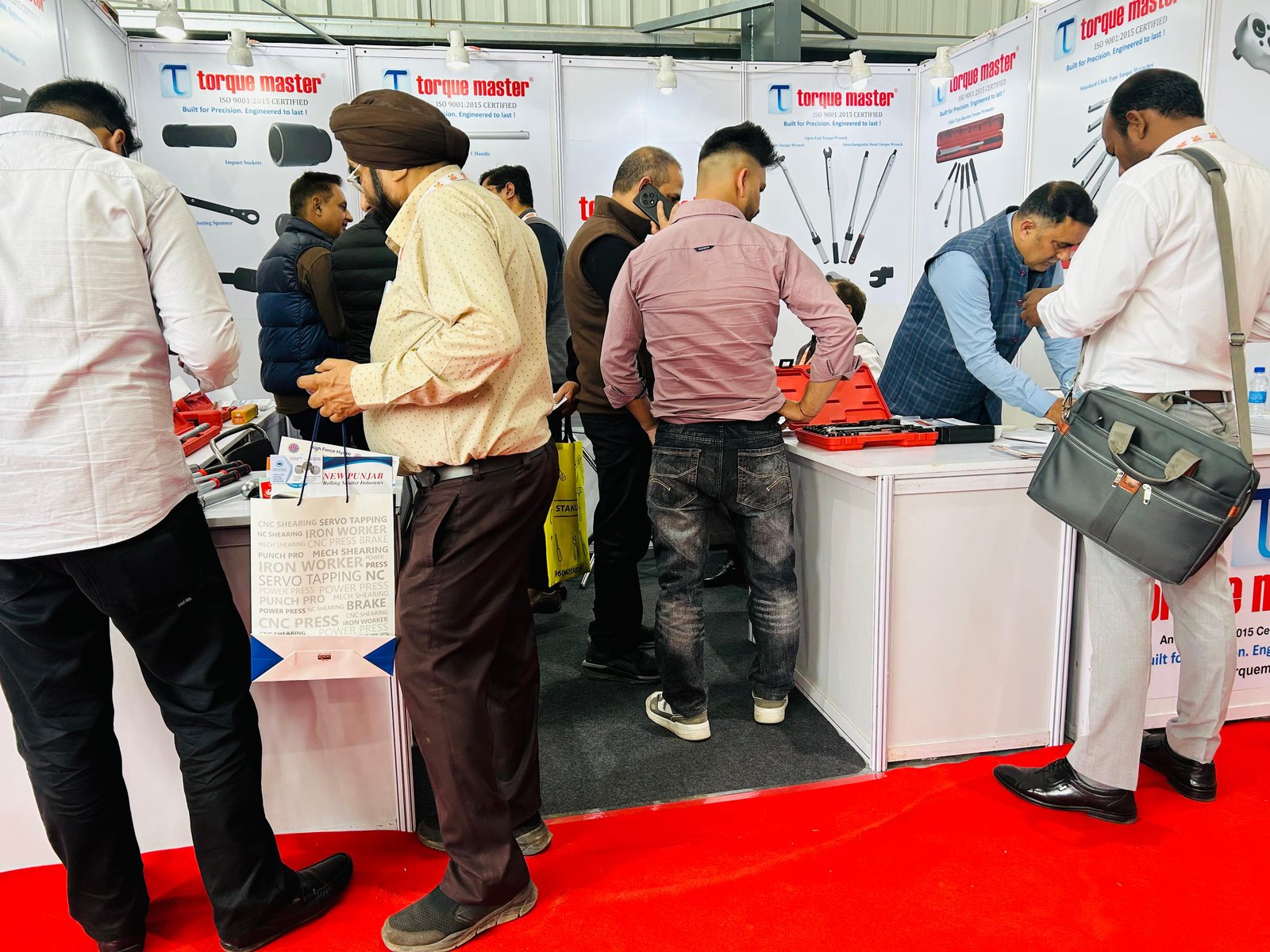 Visitors looking at torque tools at the Torque Master stall at an expo in Ludhiana, 2026